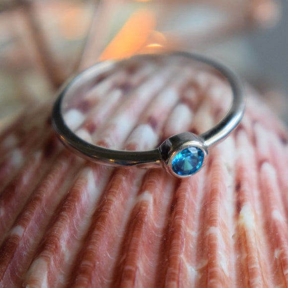 925 Sterling Silver Ring Rhodium plated Blue Topaz Cubic Zirconia https://lightningjewelry.com/